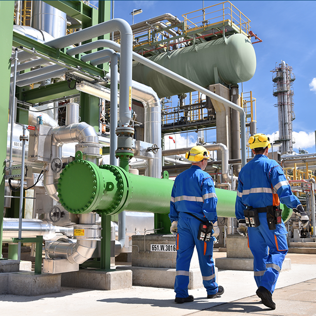 Oil workers at a refinery